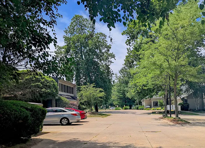 Tree-lined grounds and buildings outside Dr. Lamkin’s Akron practice